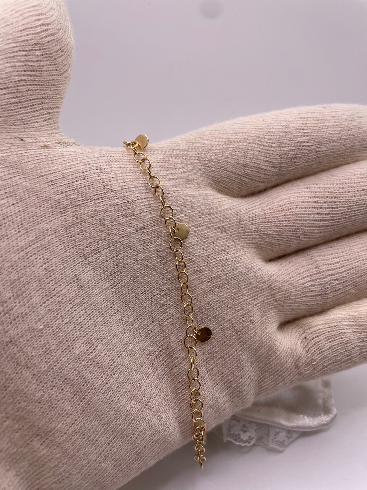 Goldarmband mit Platten Charms