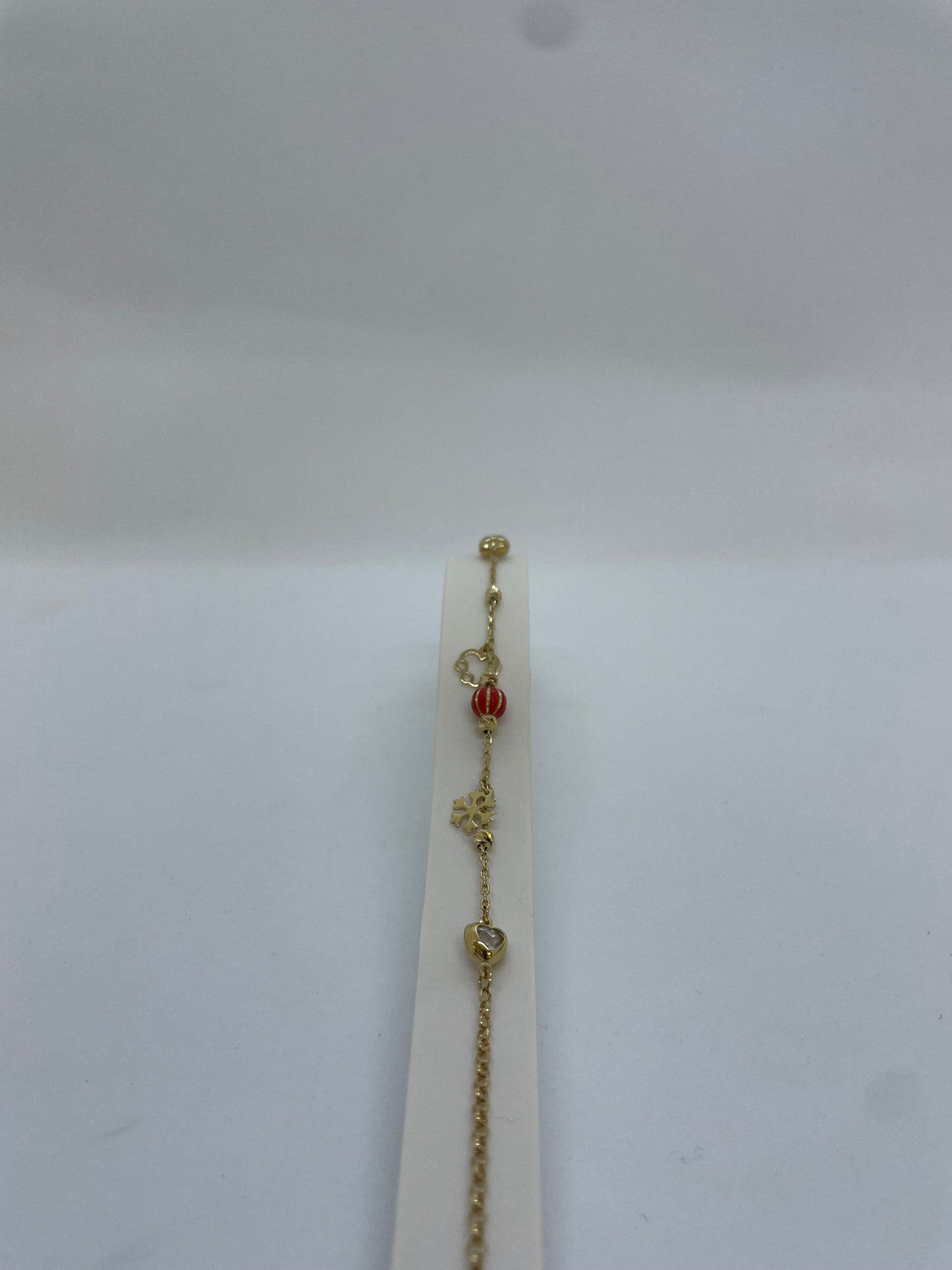 Goldarmband mit Charms