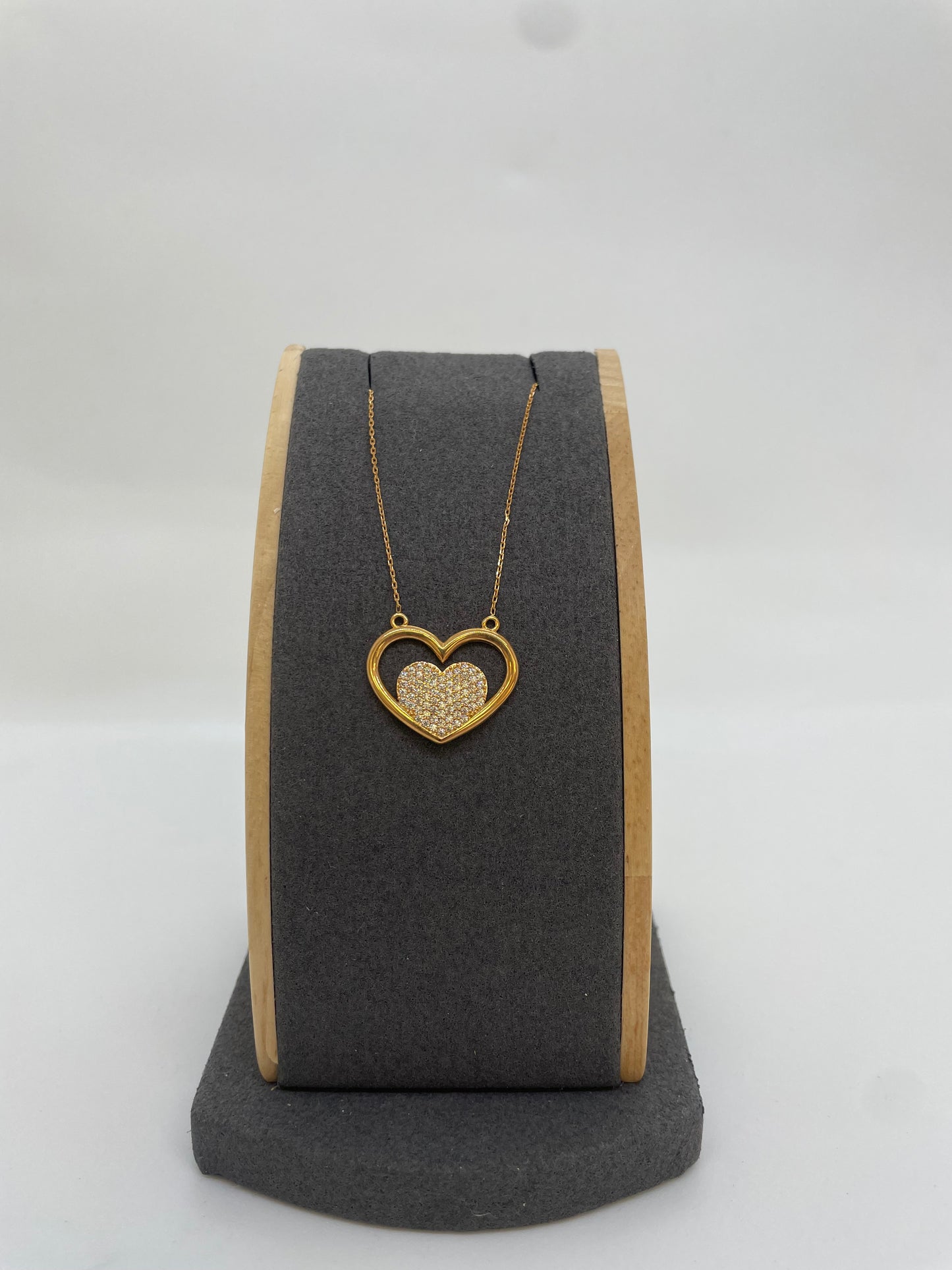 Rosé-Goldkette mit Herzanhänger und Steinen